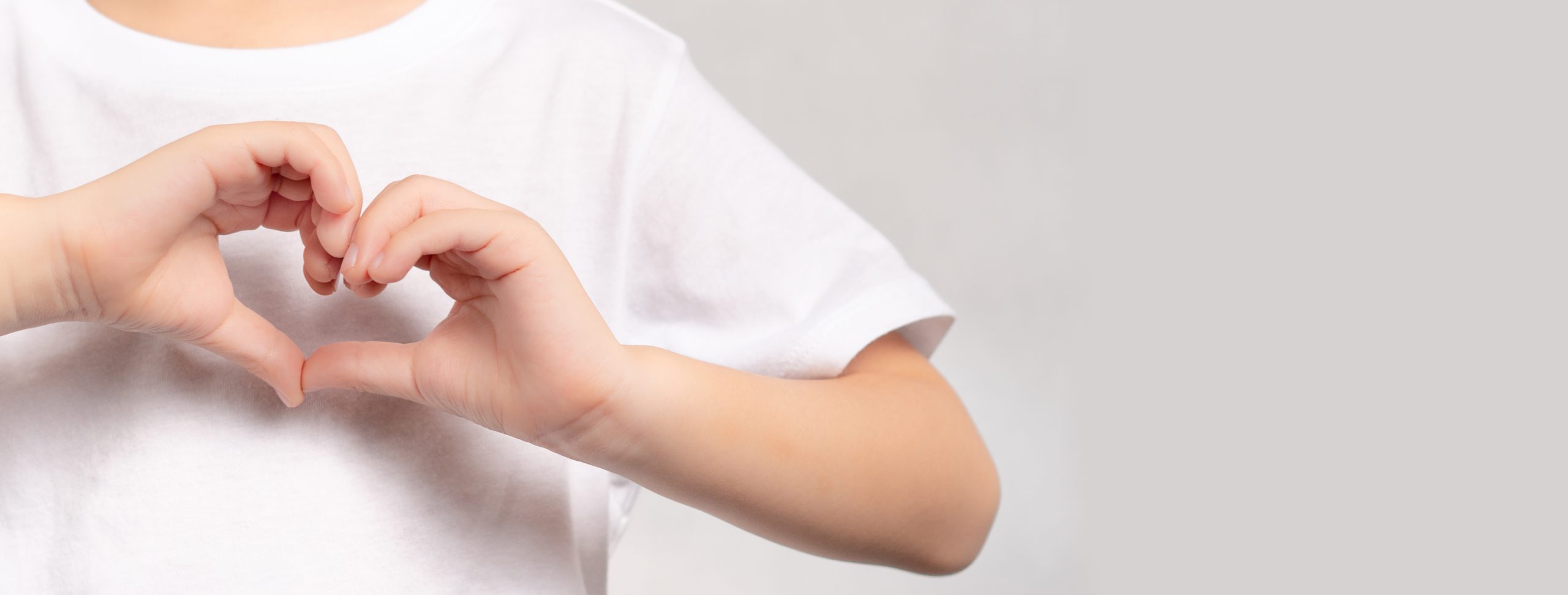 banner adorable little child s hands gesture heart shape showing love kindness concept health care charity organ donation generous pleasure hopeful love world heart day scaled